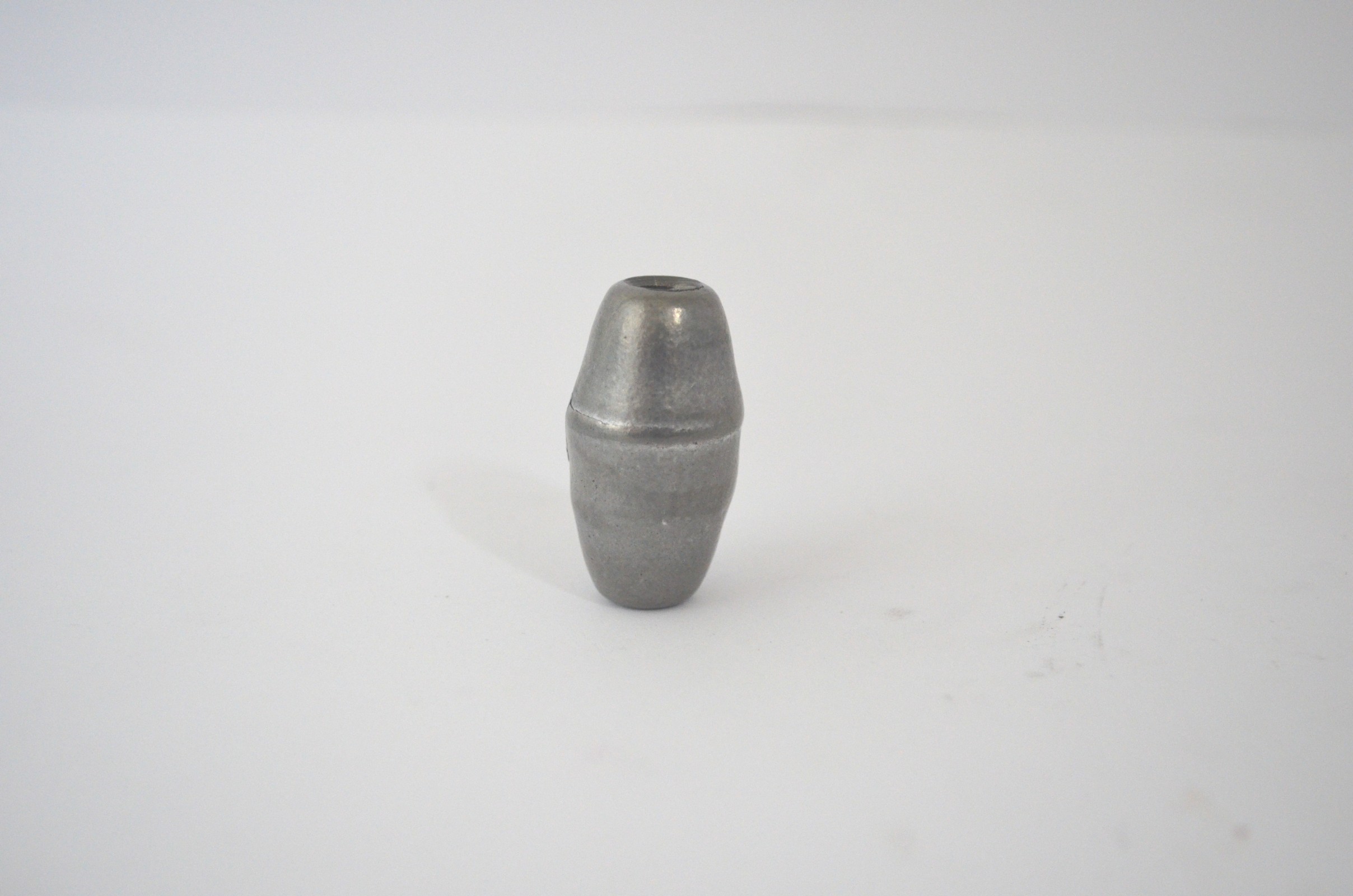 Tønneformet lodd med 10mm hull og vekt 65 gr.